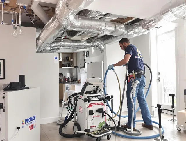 North Reading Air Duct Cleaning technician performing advanced pure duct cleaning with specialized equipment in North Reading